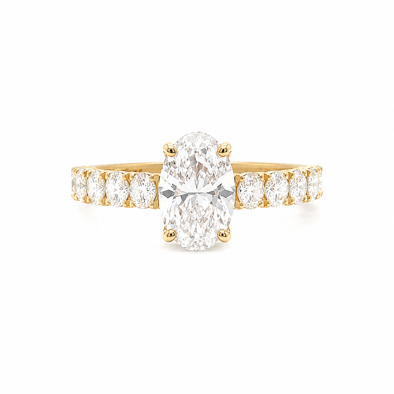 Oval Diamond Engagement Ring with oval diamonds band
