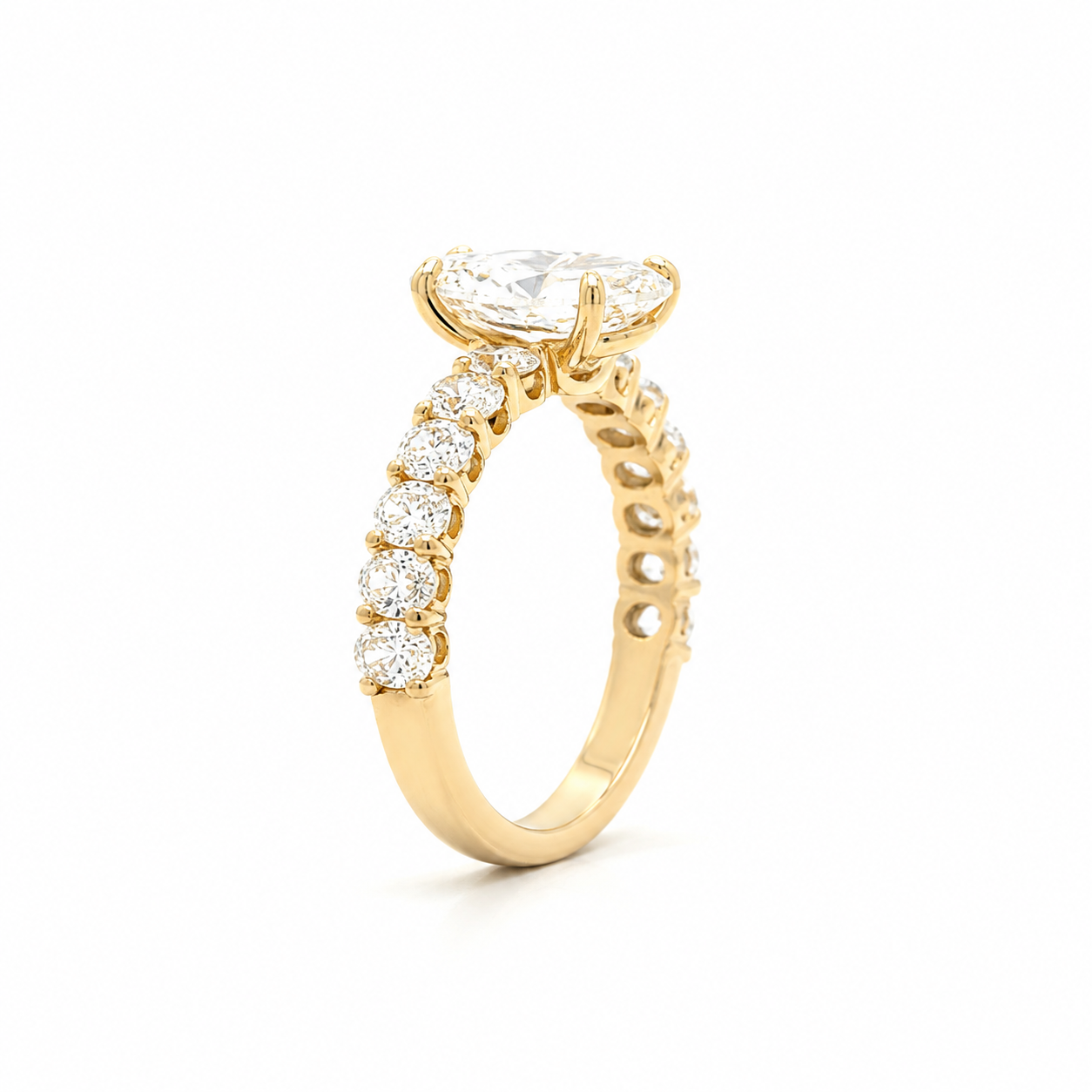 Oval Diamond Engagement Ring with oval diamonds band