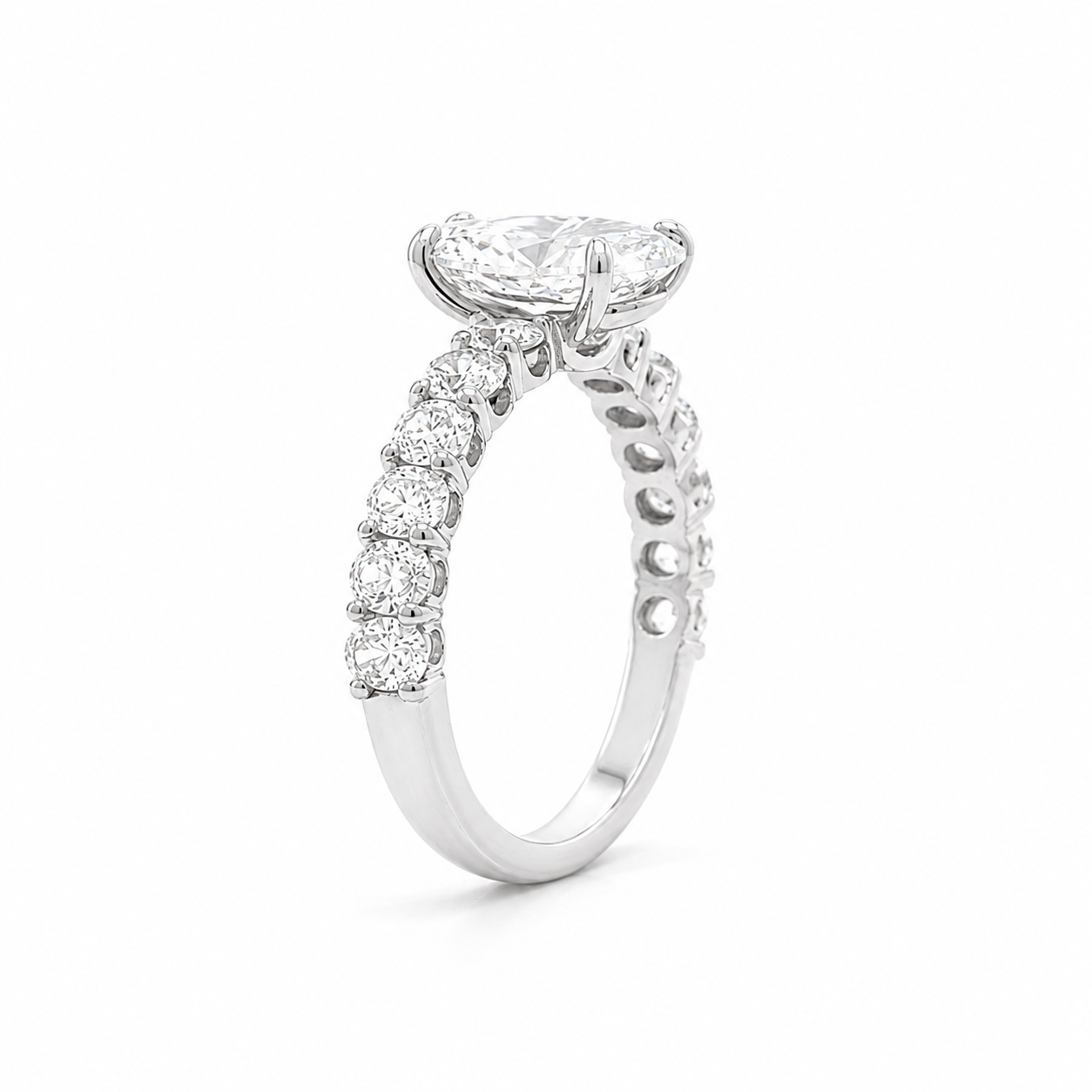 Oval Diamond Engagement Ring with oval diamonds band