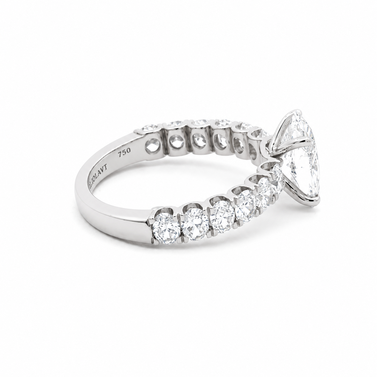 Oval Diamond Engagement Ring with oval diamonds band