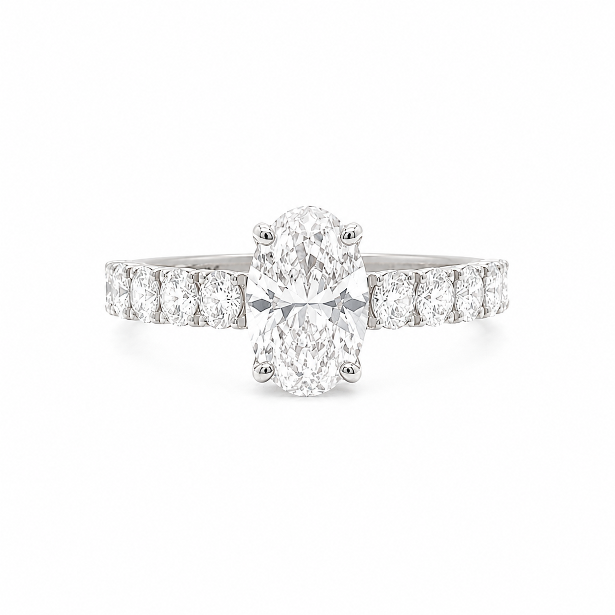 Oval Diamond Engagement Ring with oval diamonds band