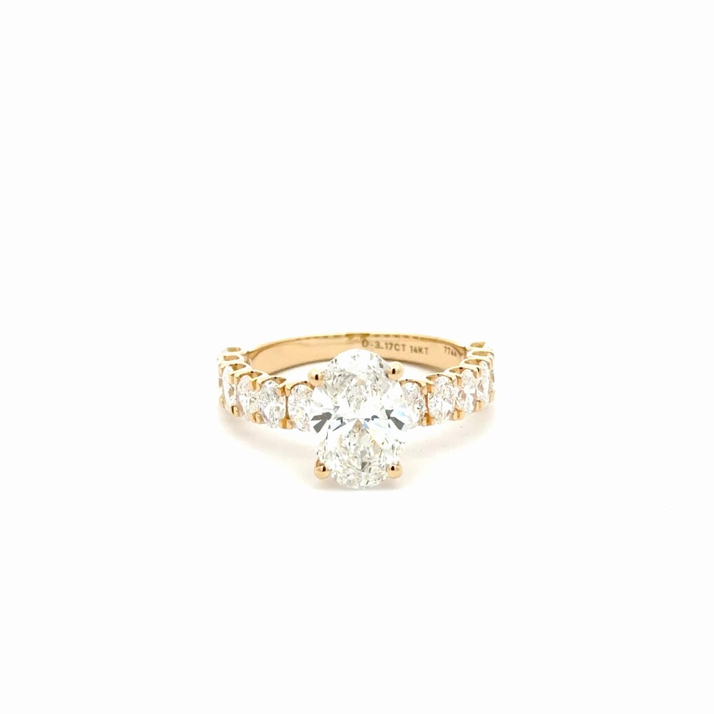 Oval Diamond Engagement Ring with oval diamonds band